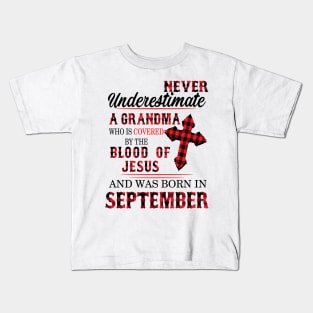 Never Underestimate A Grandma Blood Of Jesus September Kids T-Shirt